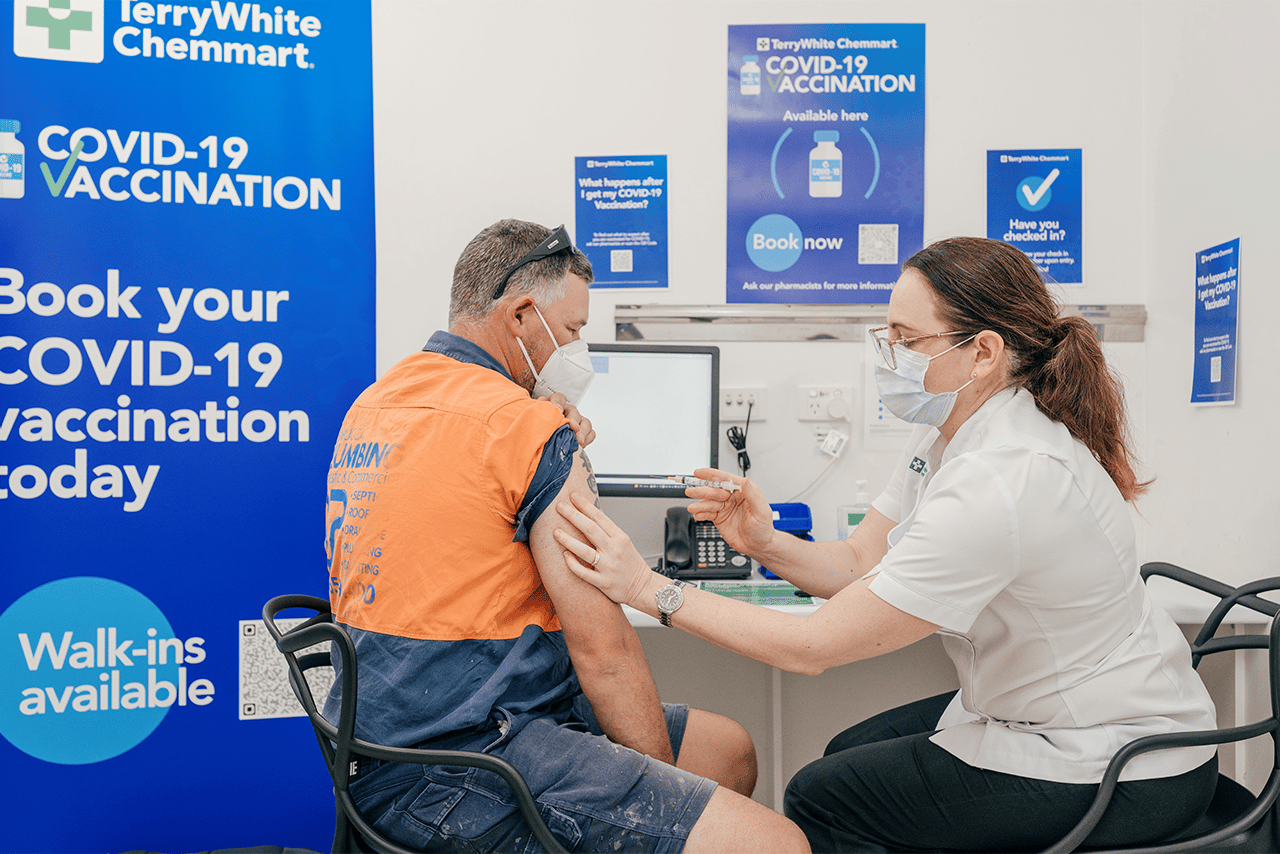 TerryWhite Chemmart customer receiving a COVID-19 vaccination
