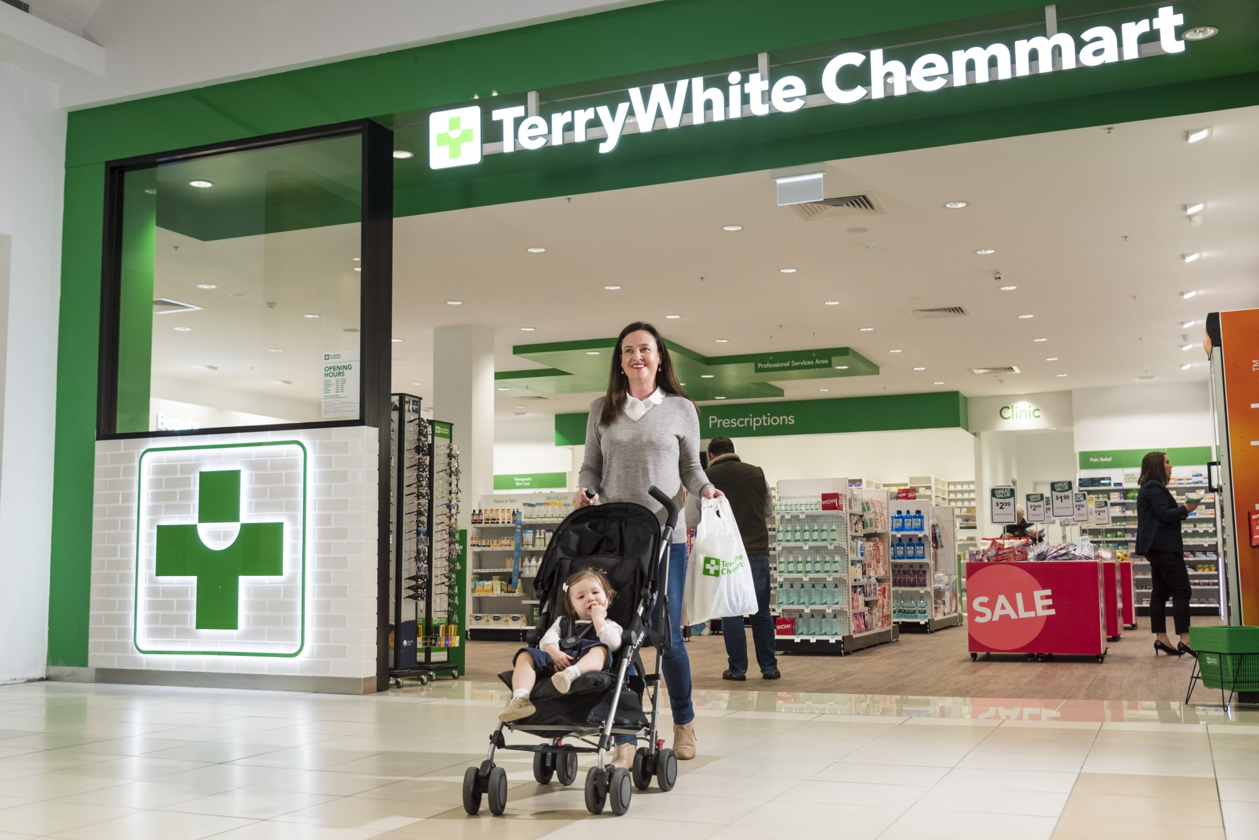 Customer with her baby at TerryWhite Chemmart pharmacy
